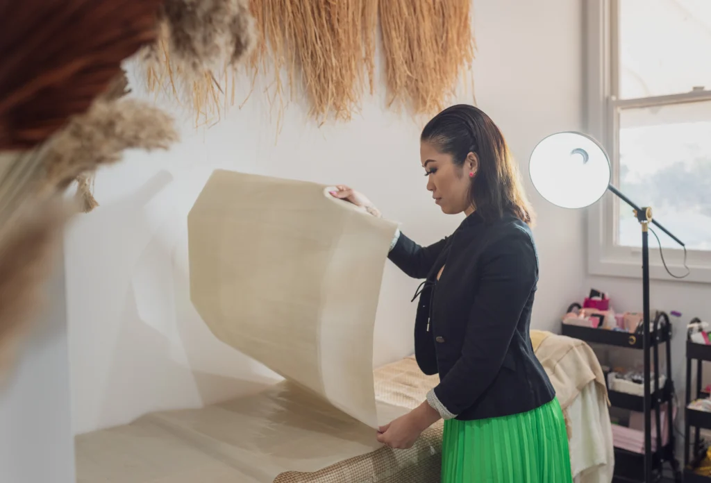 Anneca - Barossa Valley's Lash, brow and make-up expert carefully preparing her studio for her next client